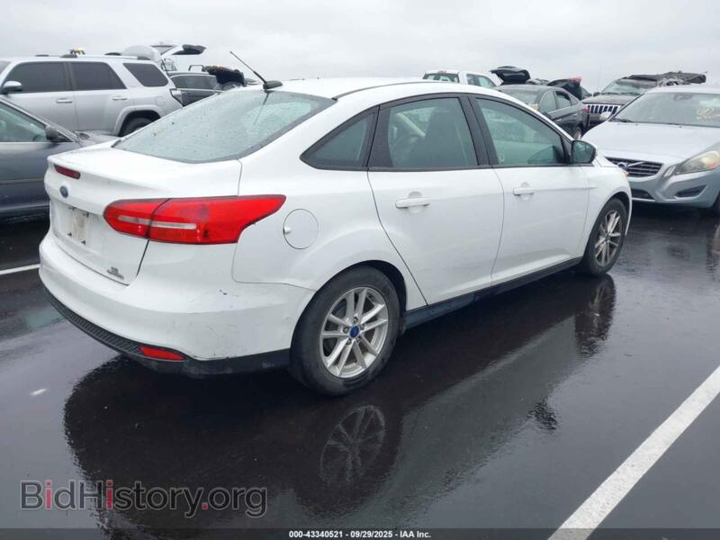 2016 Ford FOCUS (VIN 1FADP3F29GL365542) — фото 4 из 16