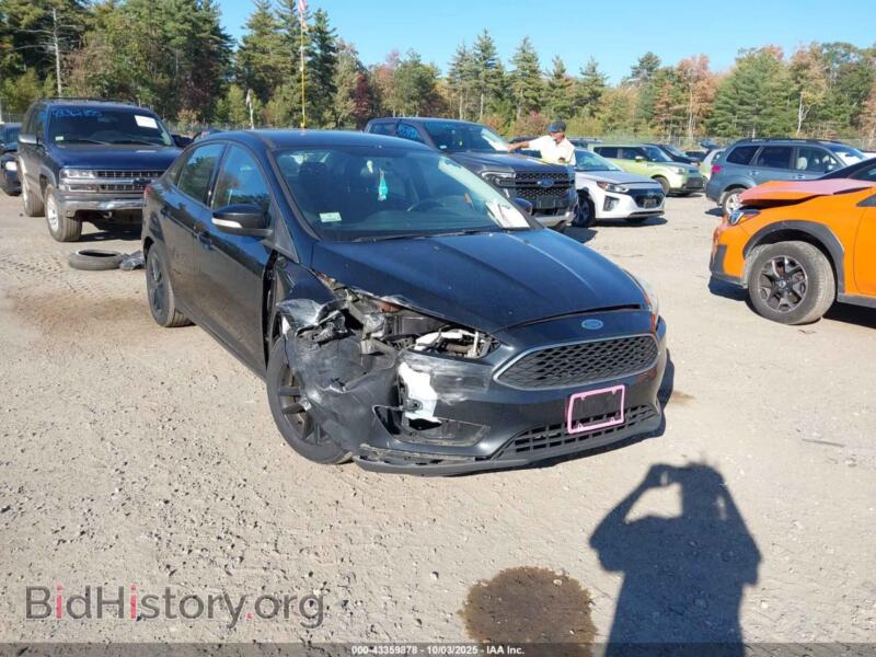 2016 Ford FOCUS SE (VIN 1FADP3F27GL232083) — photo 1 of 12, IAAI, damage: right front