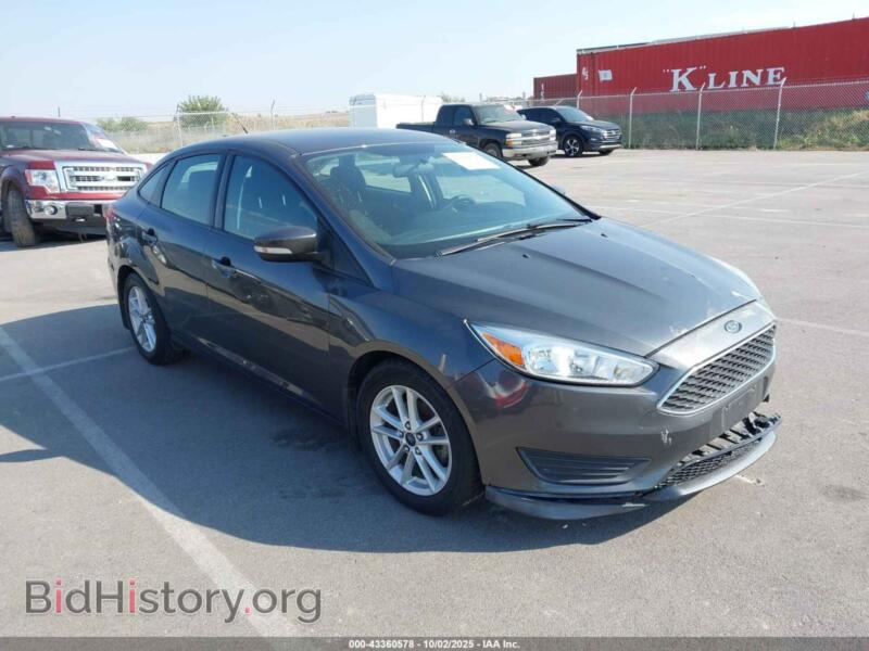 2016 Ford FOCUS SE (VIN 1FADP3F27GL261857) — photo 1 of 12, IAAI, damage: left side