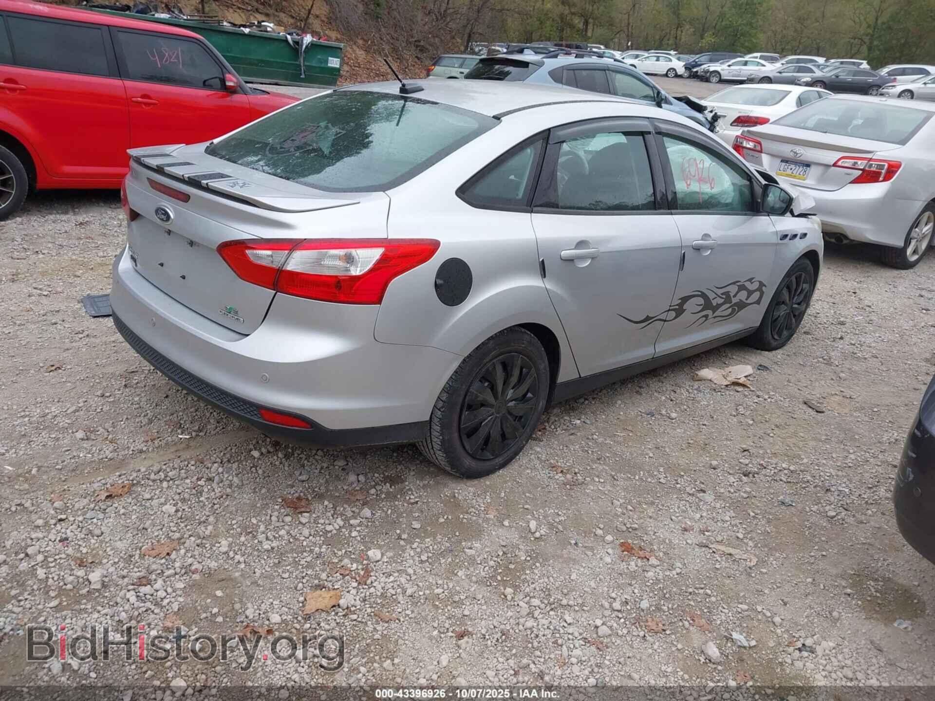 2014 FORD FOCUS - VIN: 1FADP3F2XEL136560 - Photo 4
