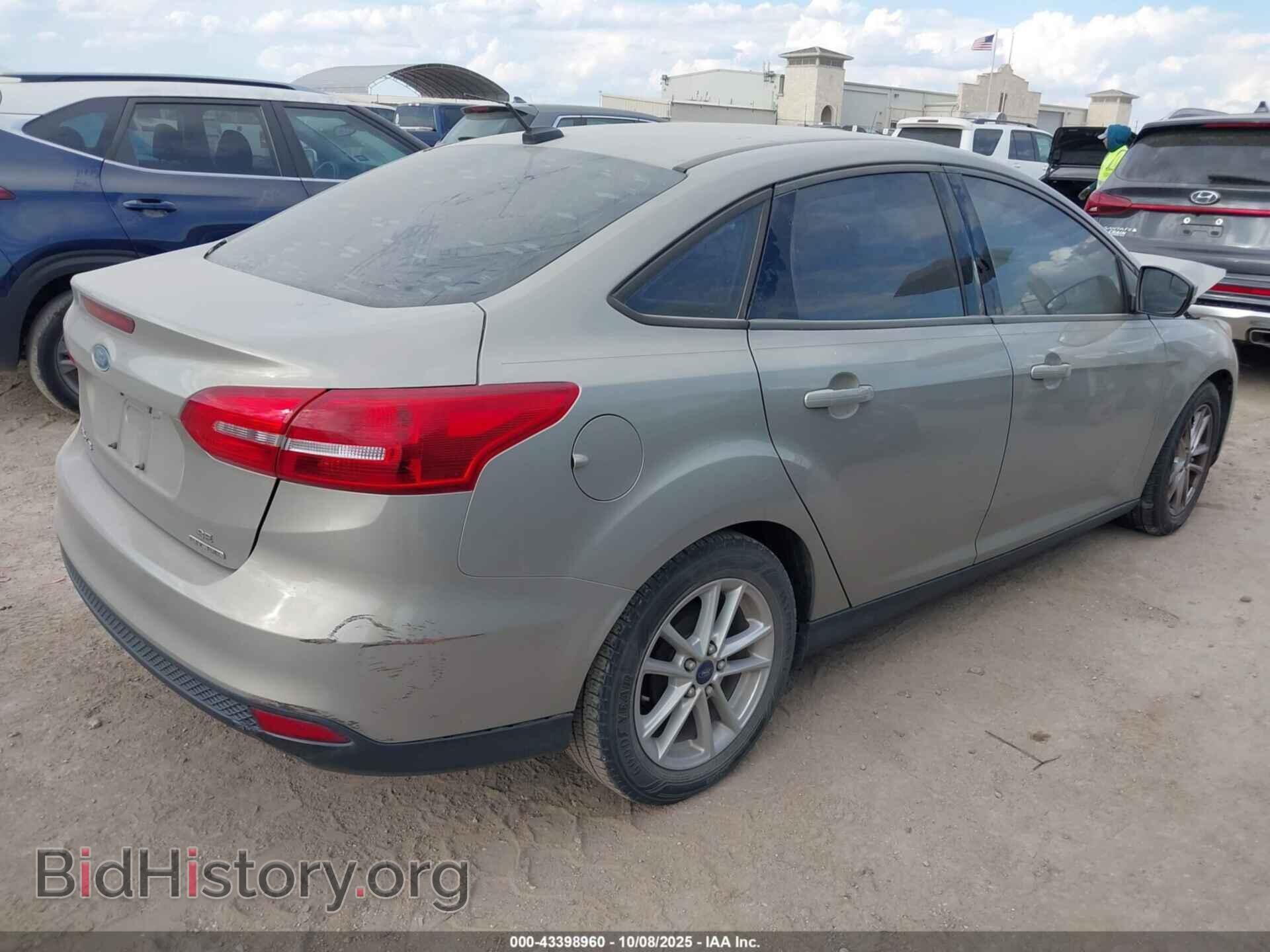 2016 FORD FOCUS - VIN: 1FADP3F25GL372309 - Фото 4