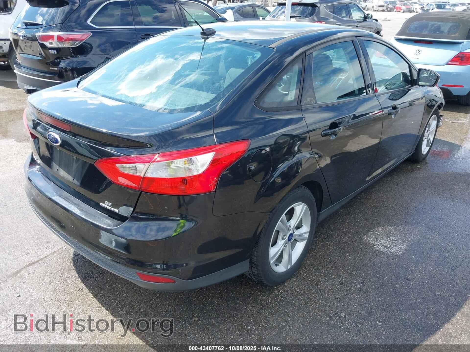 2014 FORD FOCUS - VIN: 1FADP3F21EL406288 - Photo 4