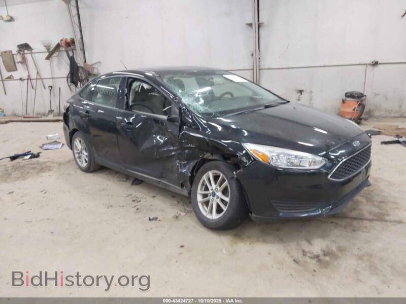 2015 Ford FOCUS SE (VIN 1FADP3F2XFL243433) — фото 1 из 16, IAAI, повреждение: правый бок