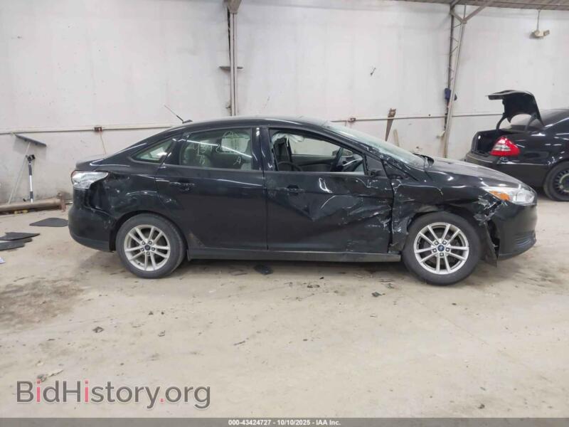 2015 Ford FOCUS (VIN 1FADP3F2XFL243433) — фото 13 из 16