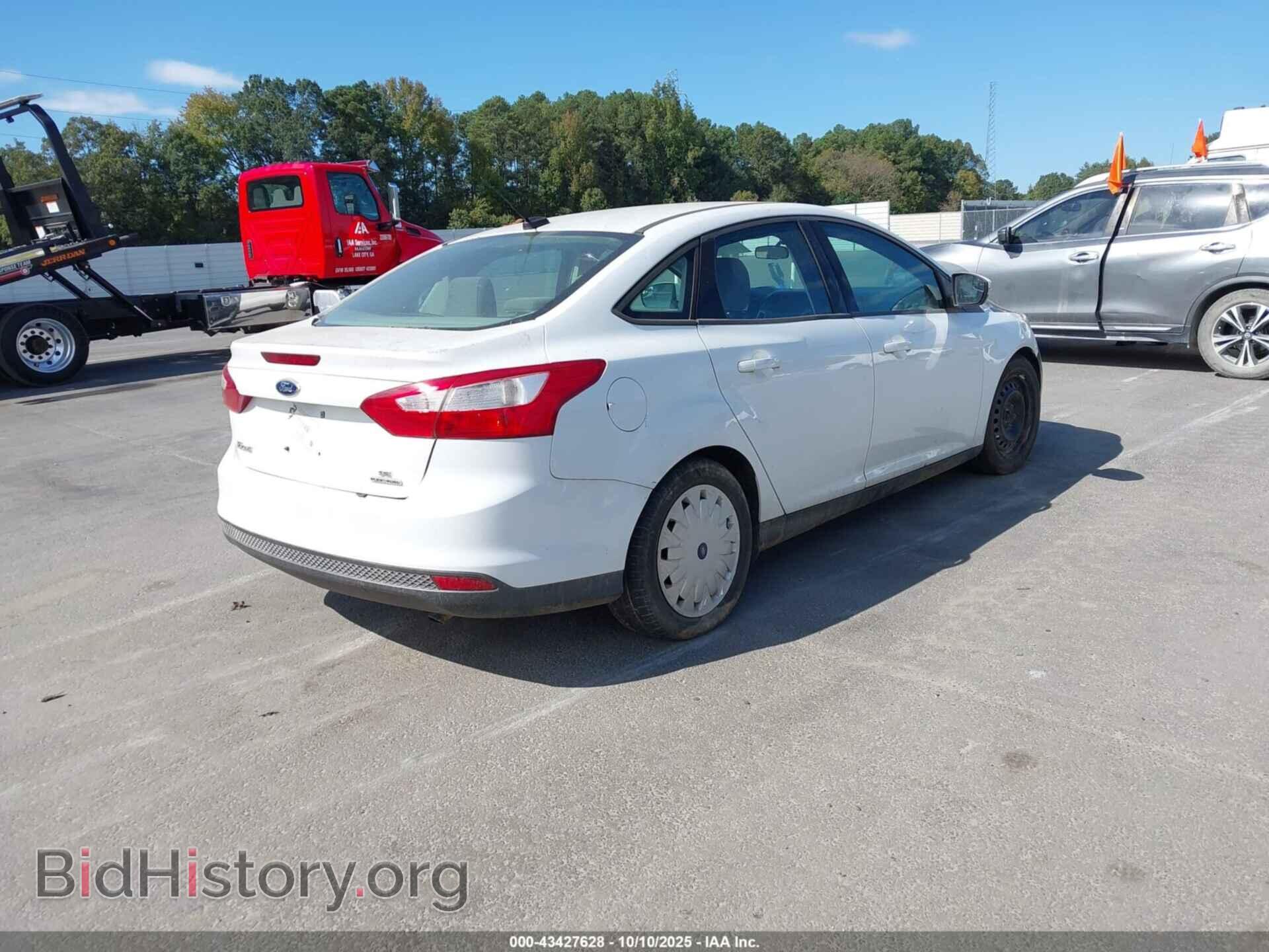 2014 FORD FOCUS - VIN: 1FADP3F28EL312912 - Photo 4