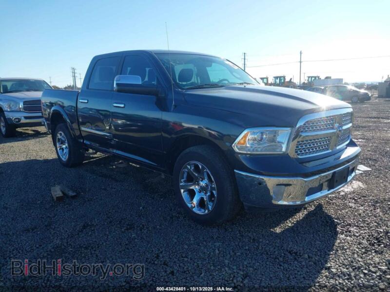 2018 RAM 1500 Laramie 4X4 5'7 Box (VIN 1C6RR7NT6JS116373) — фото 1 из 22, IAAI, повреждение: правый бок