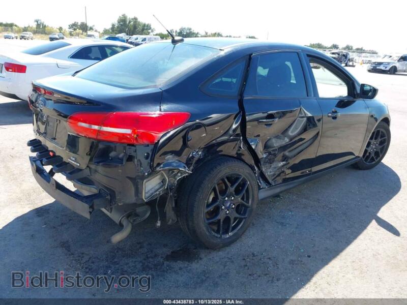 2016 Ford FOCUS (VIN 1FADP3F25GL267611) — фото 4 из 19