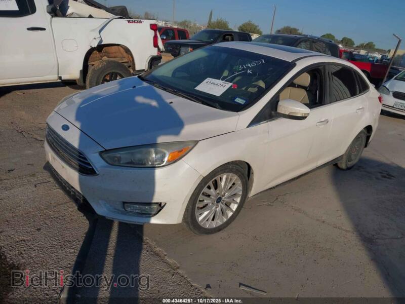 2016 Ford FOCUS (VIN 1FADP3J29GL319037) — фото 2 из 11