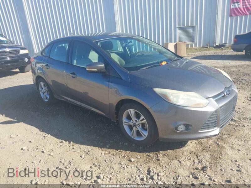 2014 Ford FOCUS SE (VIN 1FADP3F23EL402985) — photo 1 of 12, IAAI, damage: left rear