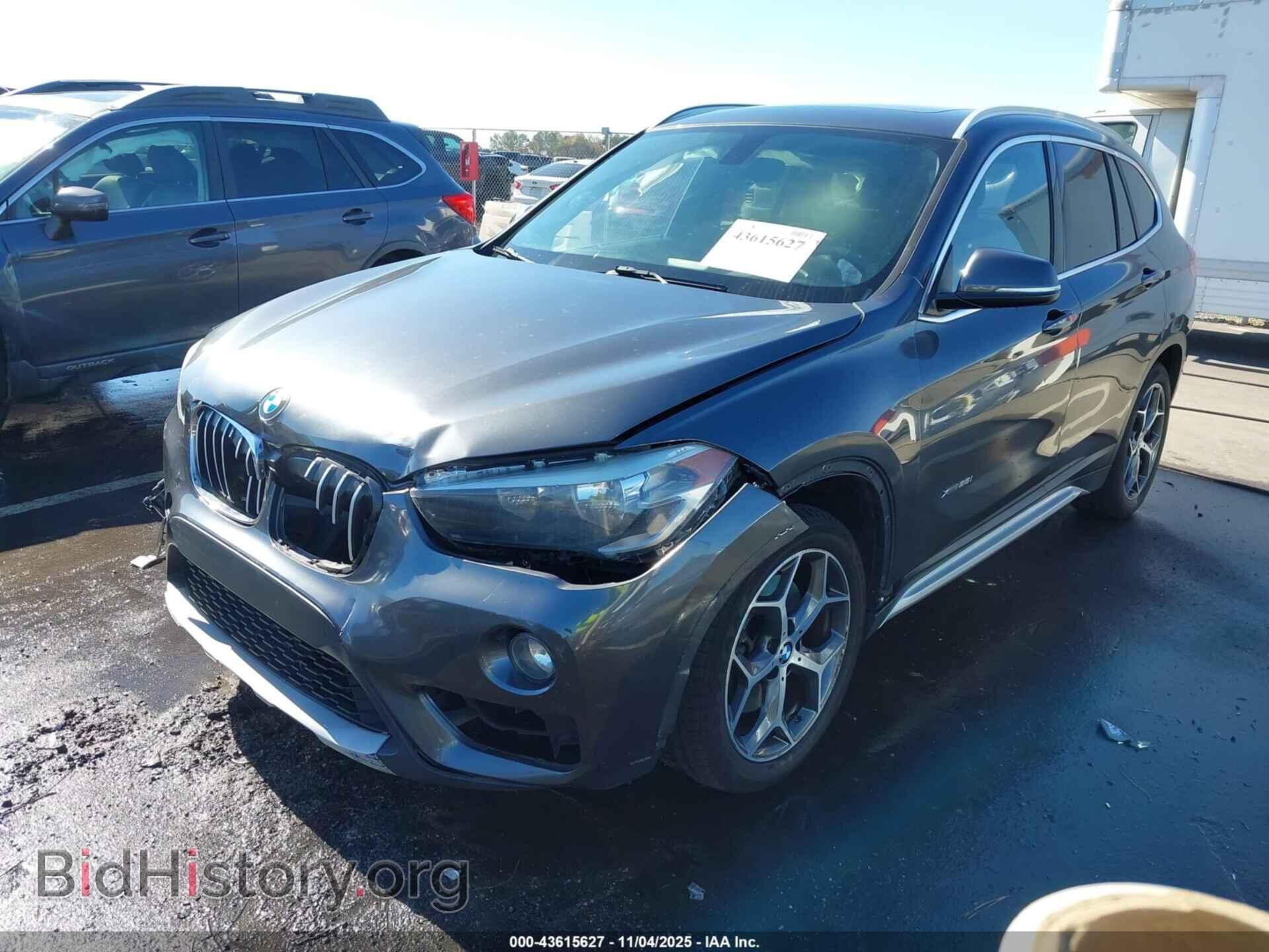 2018 BMW X1 - VIN: WBXHT3C32J5F88575 - Фото 2