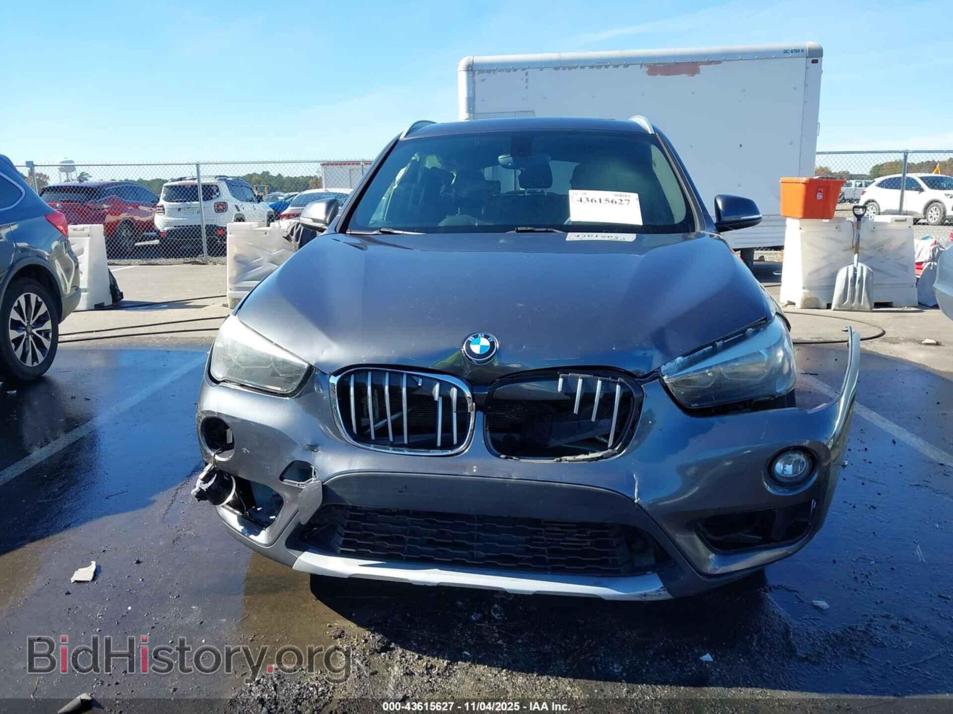 2018 BMW X1 - VIN: WBXHT3C32J5F88575 - Фото 12
