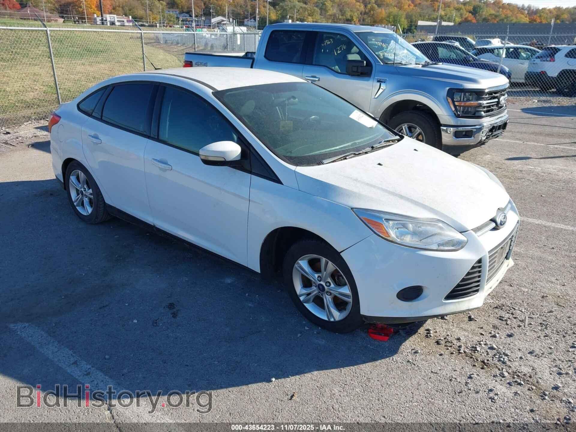 Фотография 1FADP3F20DL309727 - FORD FOCUS 2013