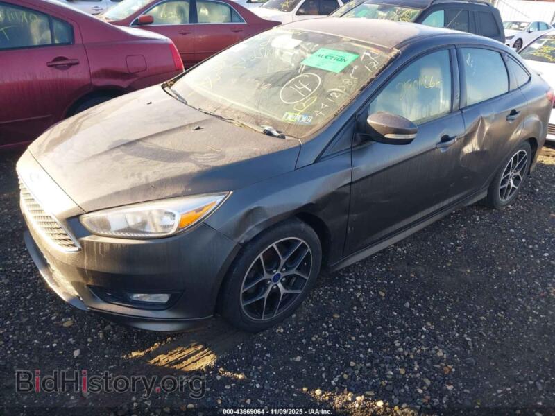 2015 Ford FOCUS (VIN 1FADP3F28FL310983) — фото 6 из 10