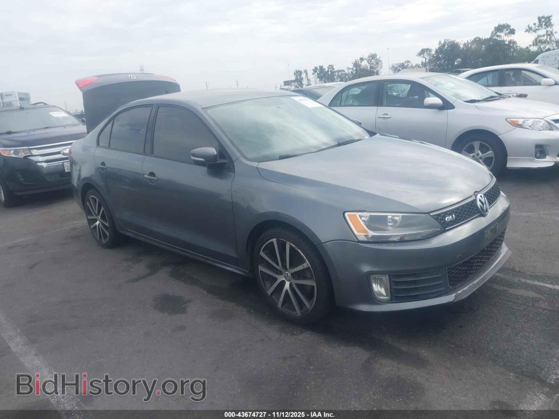 Фотография 3VWD17AJ8EM374520 - VOLKSWAGEN JETTA 2014