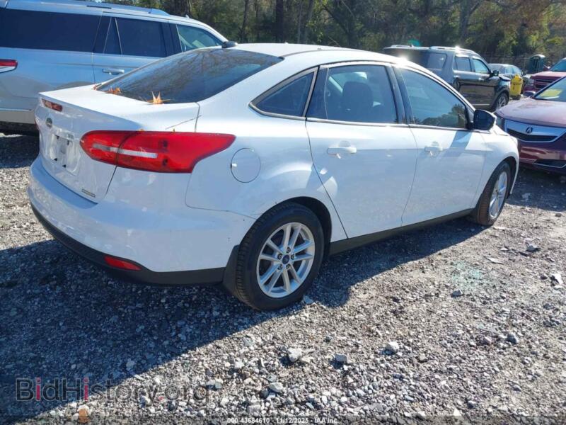 2015 Ford FOCUS (VIN 1FADP3F26FL229870) — photo 4 of 16