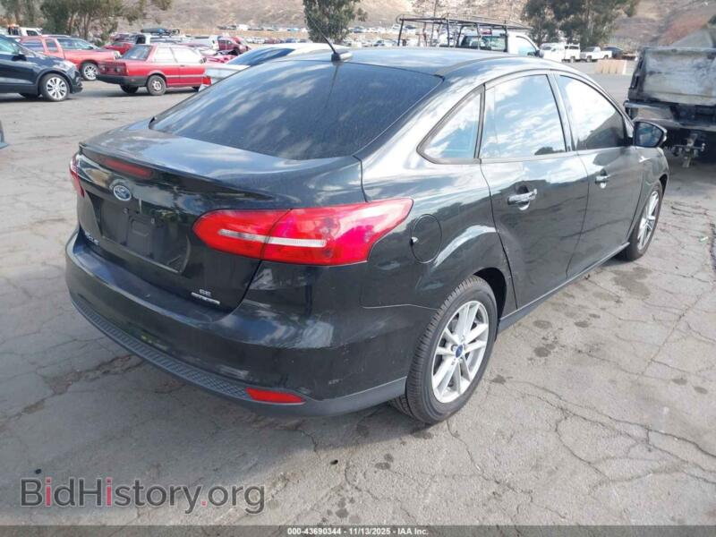 2015 Ford FOCUS (VIN 1FADP3F2XFL343354) — photo 4 of 13