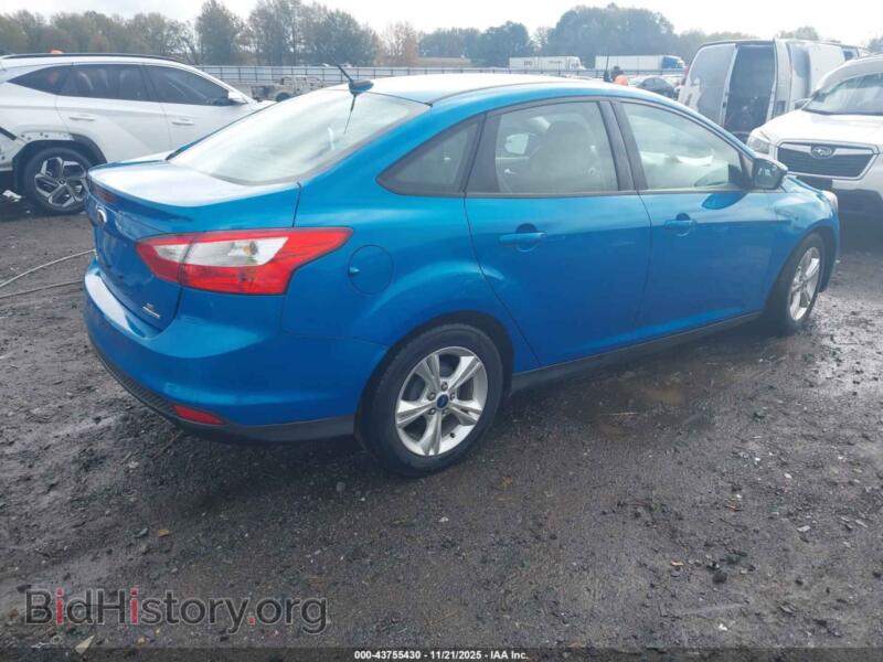 2014 Ford FOCUS (VIN 1FADP3F21EL190619) — photo 4 of 16