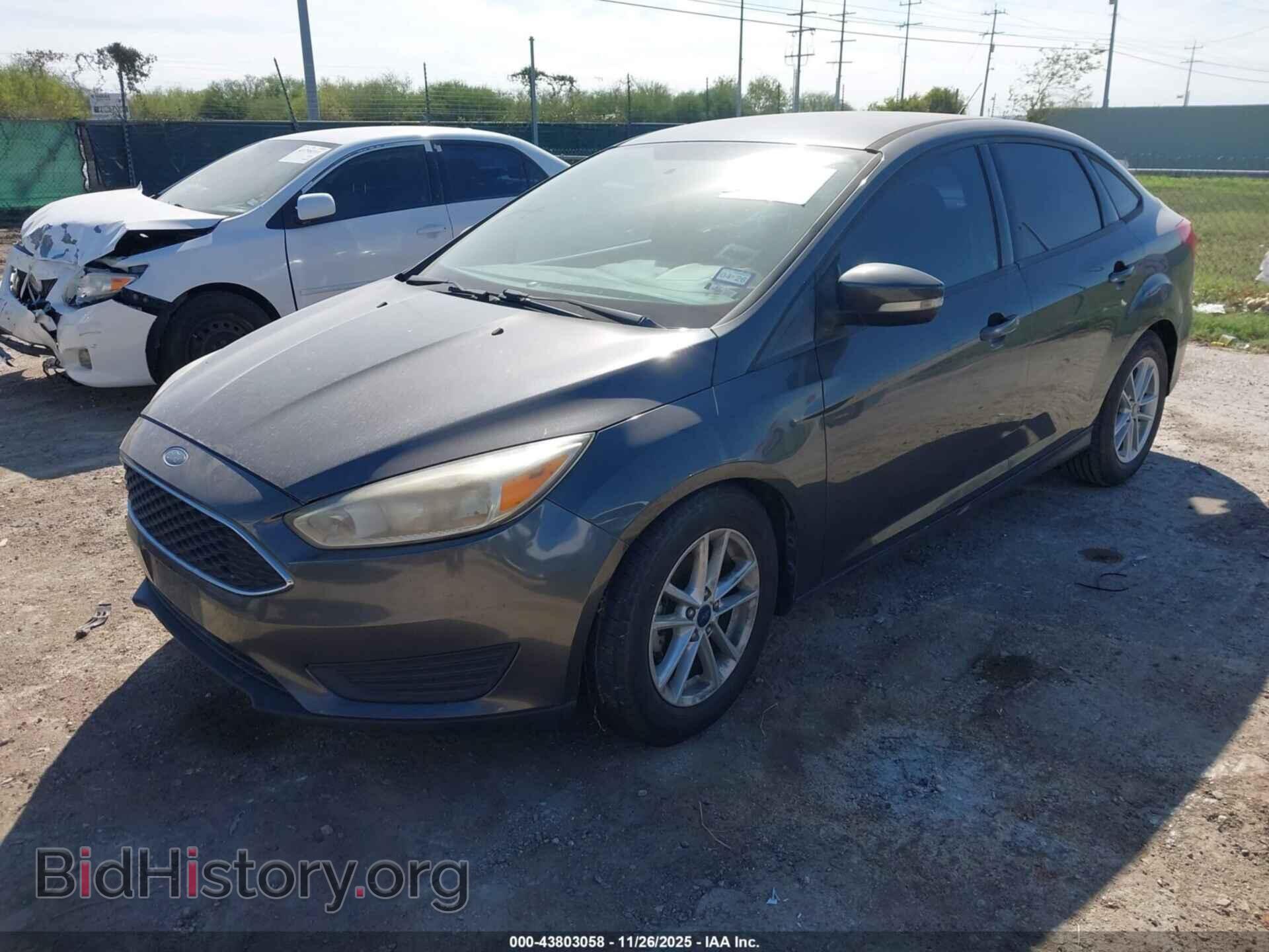 2016 FORD FOCUS - VIN: 1FADP3F23GL404593 - Фото 2