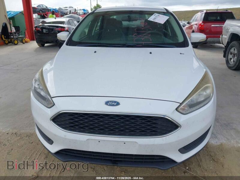 2016 Ford FOCUS (VIN 1FADP3F21GL207860) — фото 6 из 11