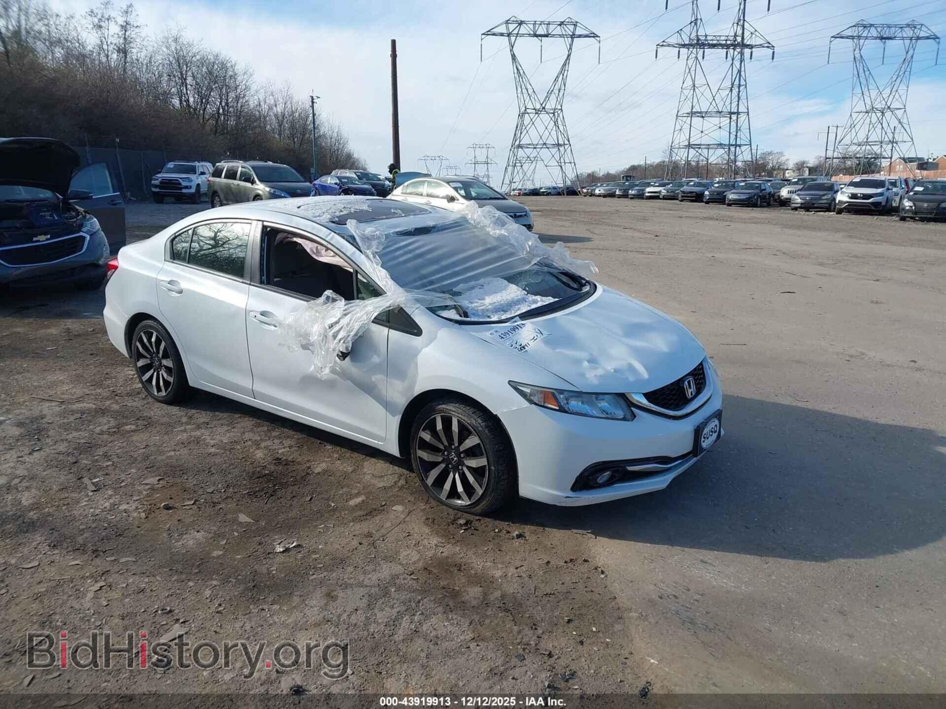 Фотография 19XFB2F90EE242534 - HONDA CIVIC 2014