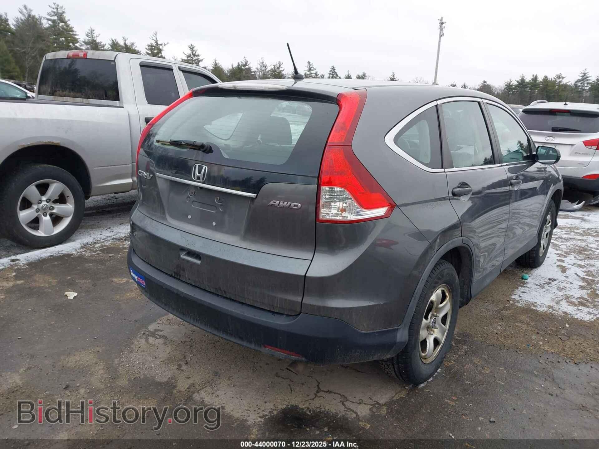 2014 HONDA CR-V - VIN: 2HKRM4H39EH670612 - Фото 4