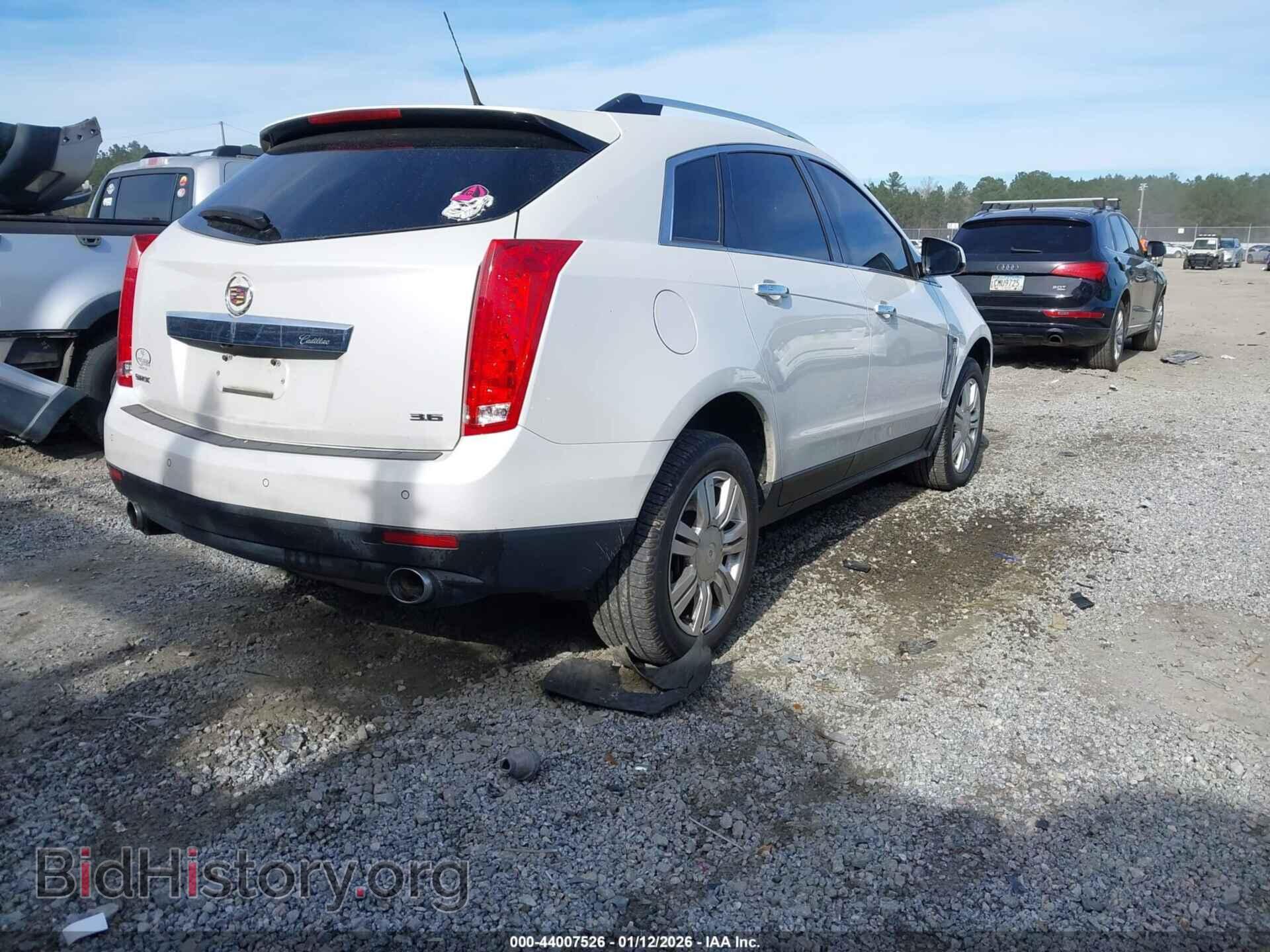 2013 CADILLAC SRX - VIN: 3GYFNCE33DS654600 - Фото 4