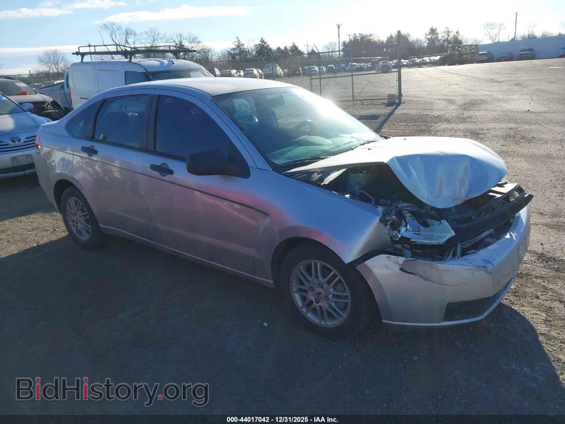 Фотография 1FAHP35N79W211054 - FORD FOCUS 2009