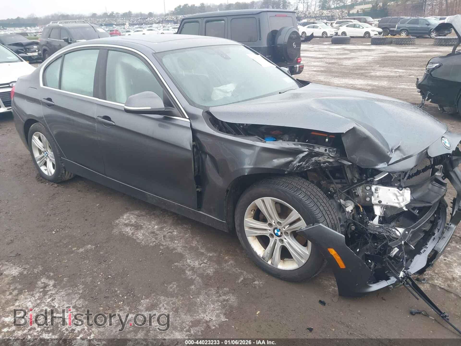 Фотография WBA8D9G5XJNU72088 - BMW 330I 2018