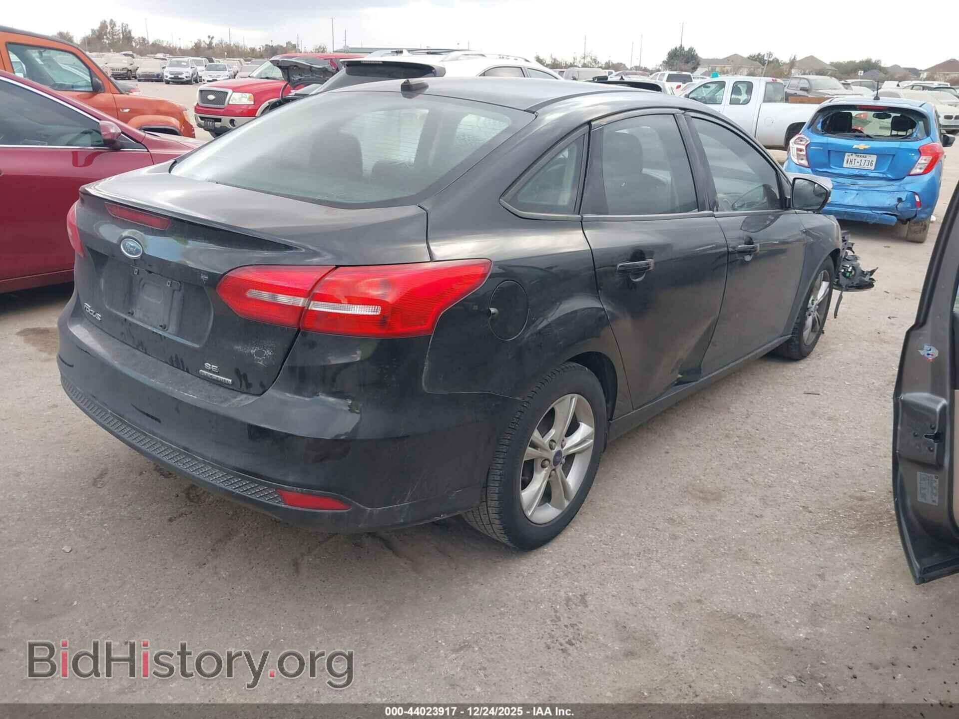 2015 FORD FOCUS - VIN: 1FADP3F23FL230703 - Photo 4