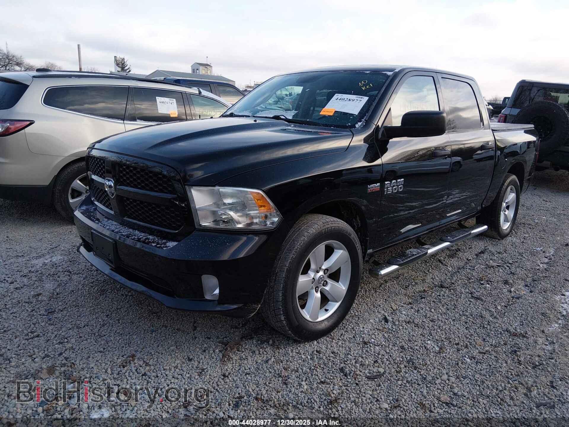 2014 RAM 1500 - VIN: 3C6RR7KT1EG324968 - Фото 2