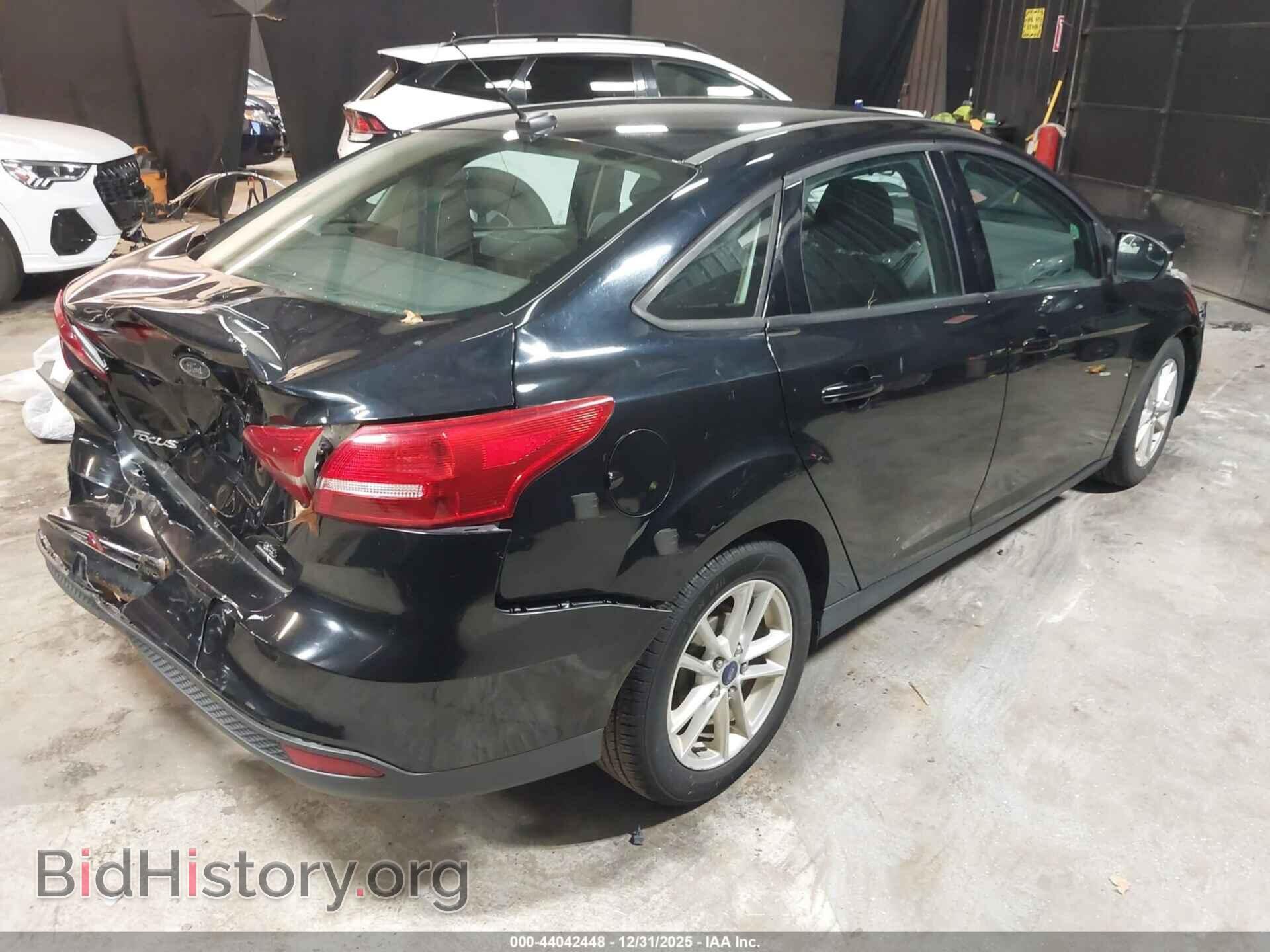 2016 FORD FOCUS - VIN: 1FADP3F29GL269474 - Фото 4