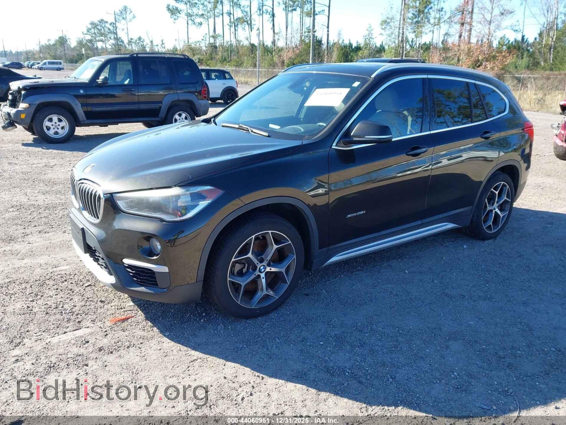 2016 BMW X1 - VIN: WBXHT3C32GP887249 - Фото 2