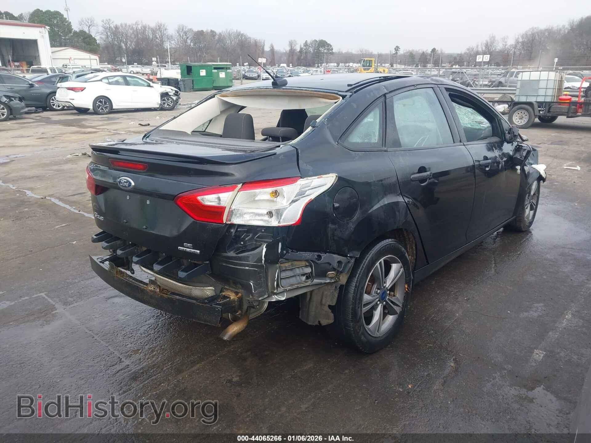 2014 FORD FOCUS - VIN: 1FADP3F27EL447900 - Photo 4