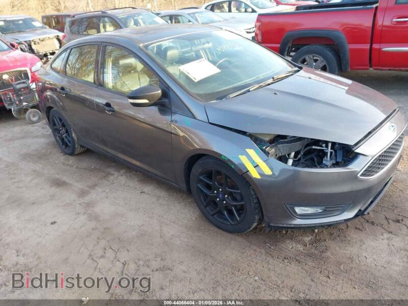 2016 Ford FOCUS SE (VIN 1FADP3F23GL256574) — фото 1 из 11, IAAI, повреждение: передняя часть