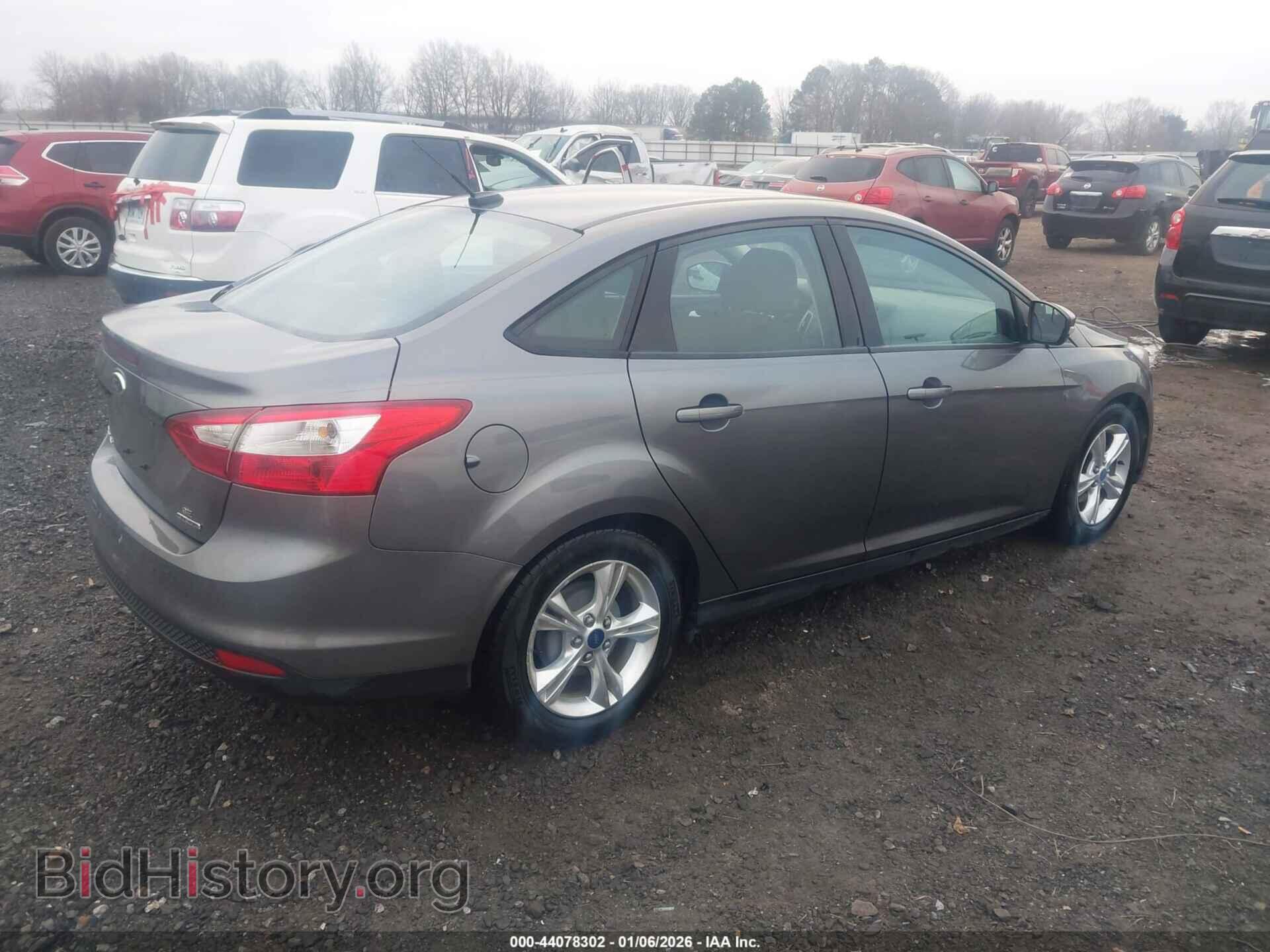2014 FORD FOCUS - VIN: 1FADP3F29EL313034 - Фото 4