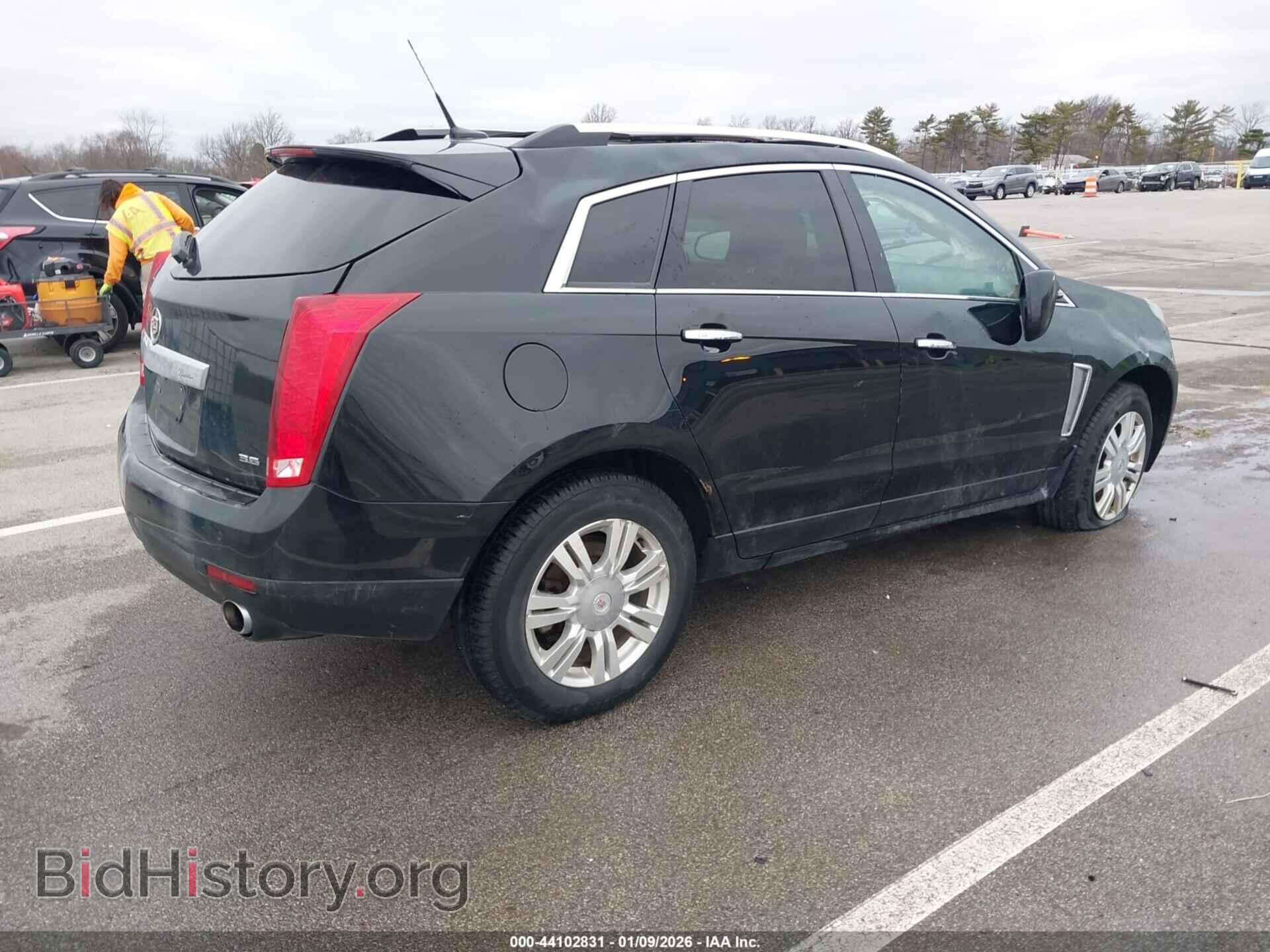 2014 CADILLAC SRX - VIN: 3GYFNEE32ES617728 - Фото 4