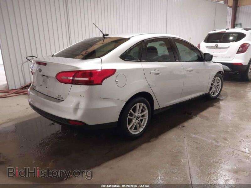 2016 Ford FOCUS (VIN 1FADP3F25GL257693) — photo 4 of 16