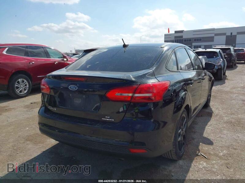 2016 Ford FOCUS (VIN 1FADP3F20GL383119) — photo 4 of 16
