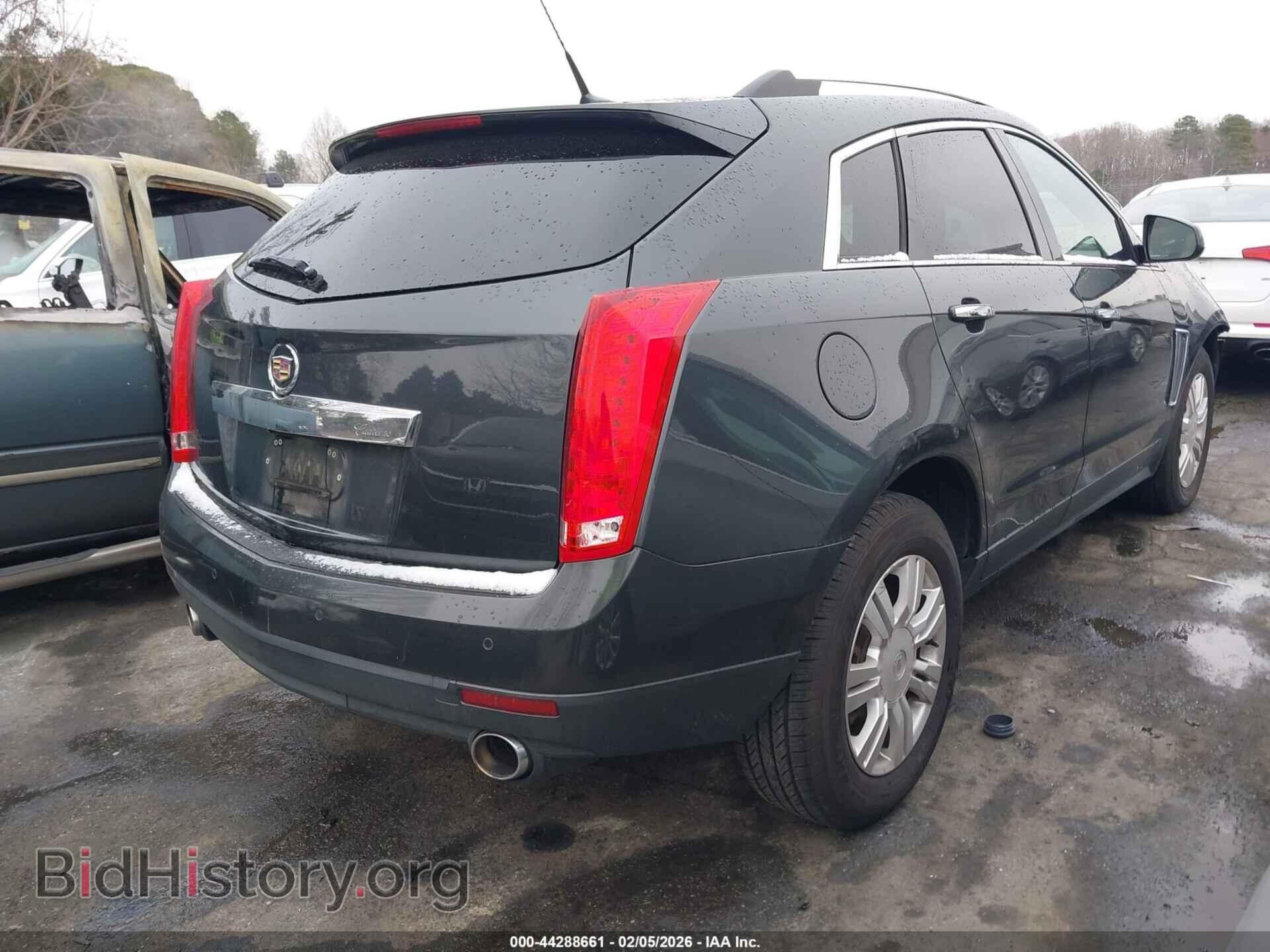 2014 CADILLAC SRX - VIN: 3GYFNBE39ES615585 - Фото 4