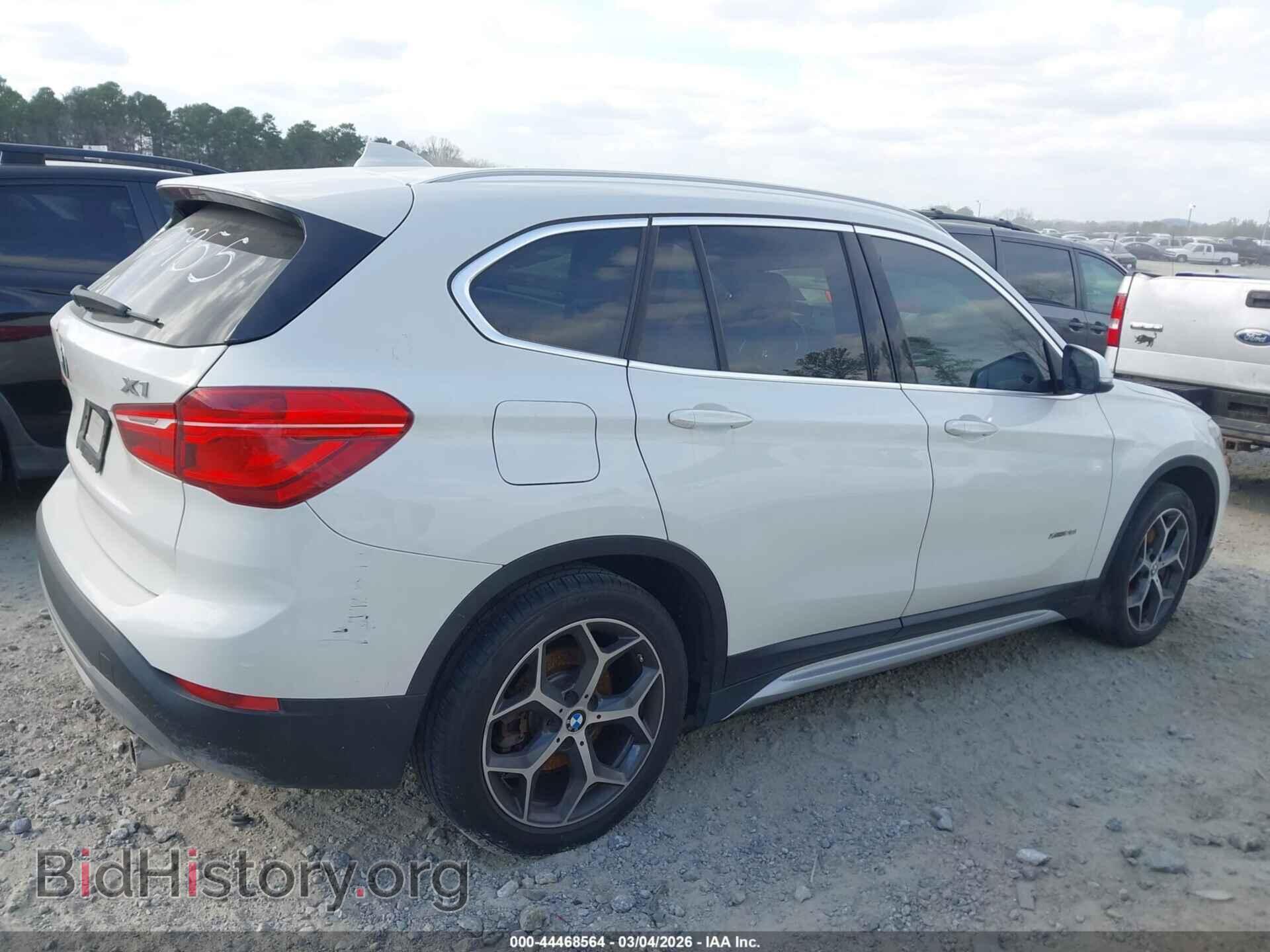 2017 BMW X1 - VIN: WBXHT3C37H5F70955 - Фото 12