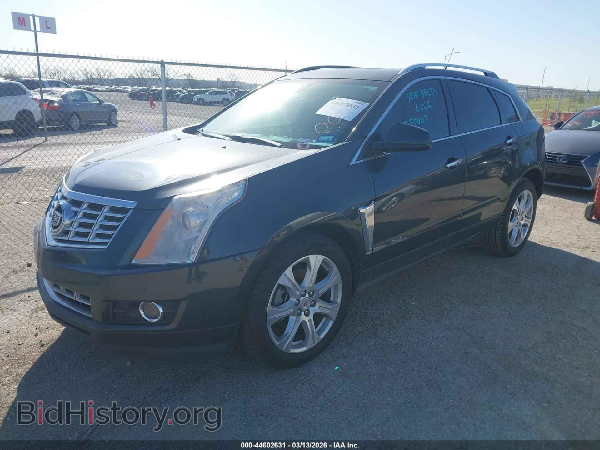 2014 CADILLAC SRX - VIN: 3GYFNDE37ES584705 - Фото 2
