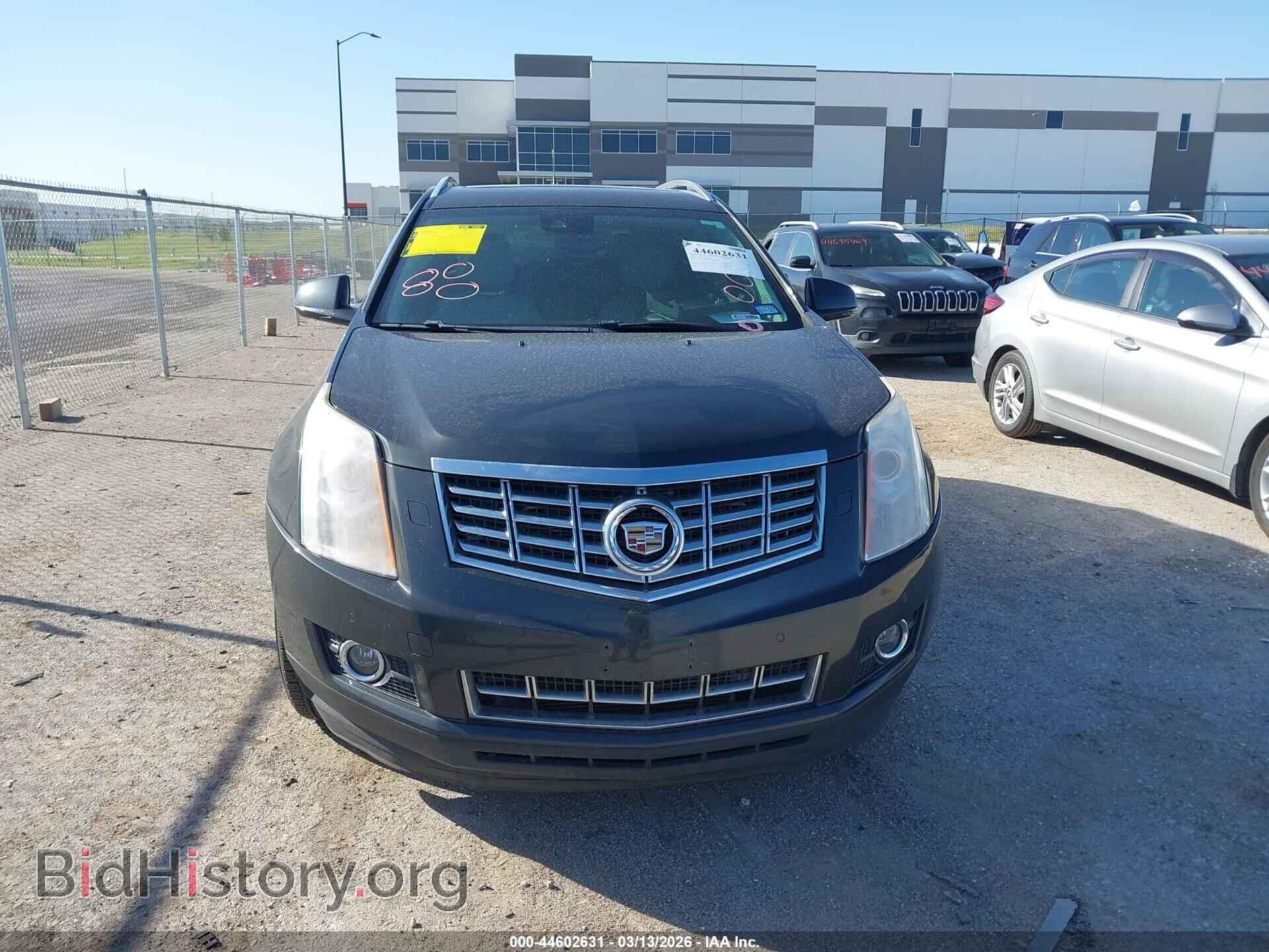 2014 CADILLAC SRX - VIN: 3GYFNDE37ES584705 - Фото 12