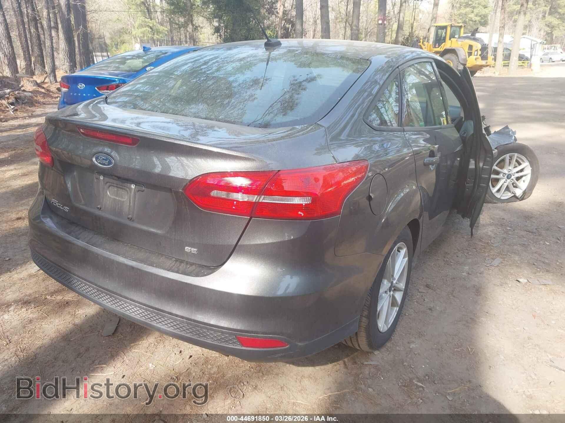 2017 FORD FOCUS - VIN: 1FADP3F27HL304904 - Photo 4