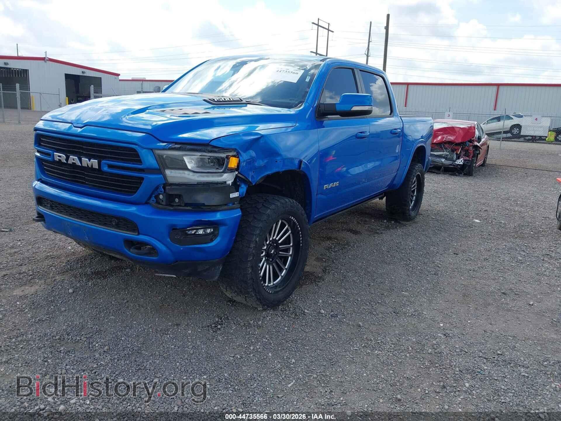 2021 RAM 1500 - VIN: 1C6SRFJT8MN779108 - Фото 2