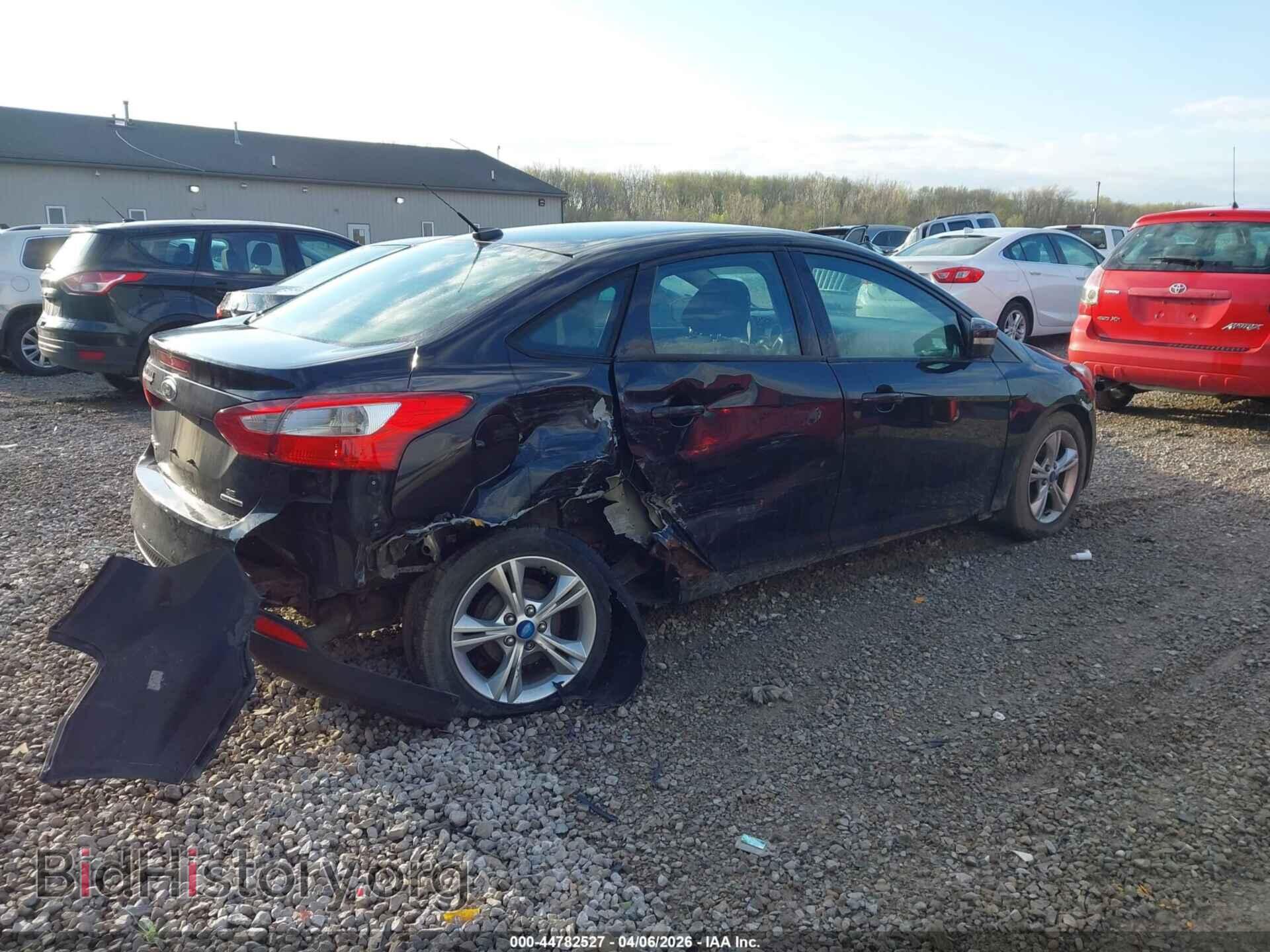 2013 FORD FOCUS - VIN: 1FADP3F26DL219403 - Photo 4