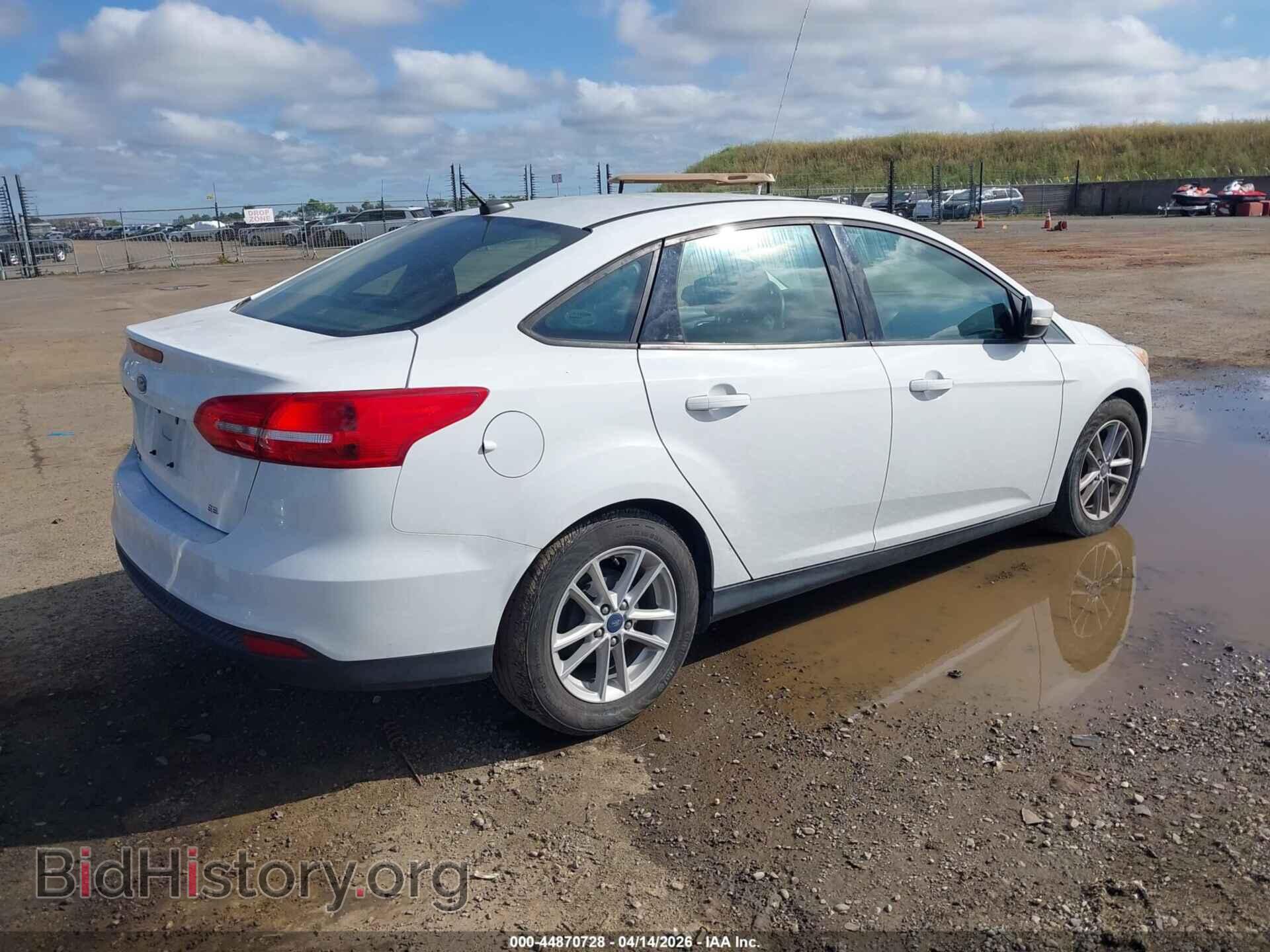 2017 FORD FOCUS - VIN: 1FADP3F27HL309312 - Photo 4