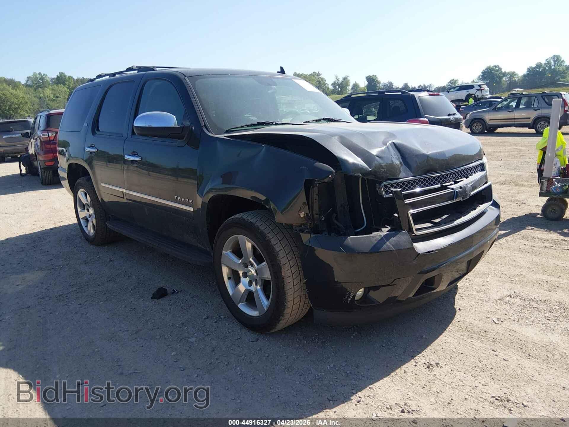 Фотография 1GNSCCE08BR302619 - CHEVROLET TAHOE 2011