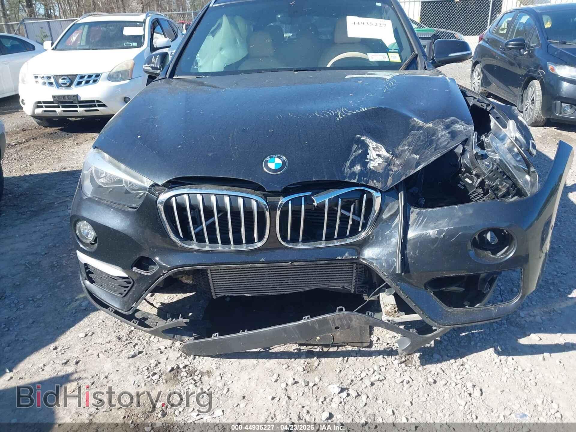 2017 BMW X1 - VIN: WBXHT3C38H5F73685 - Фото 11