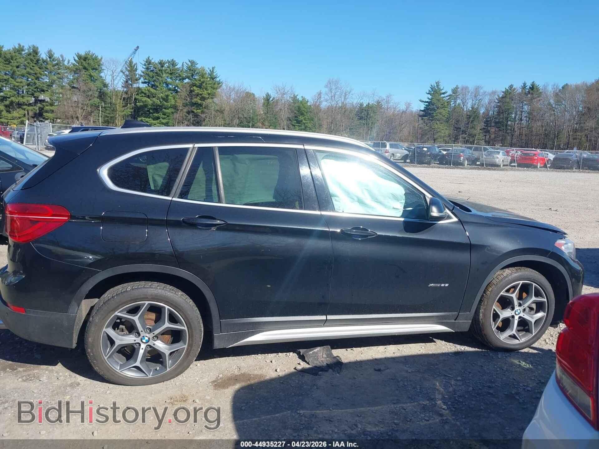 2017 BMW X1 - VIN: WBXHT3C38H5F73685 - Фото 12