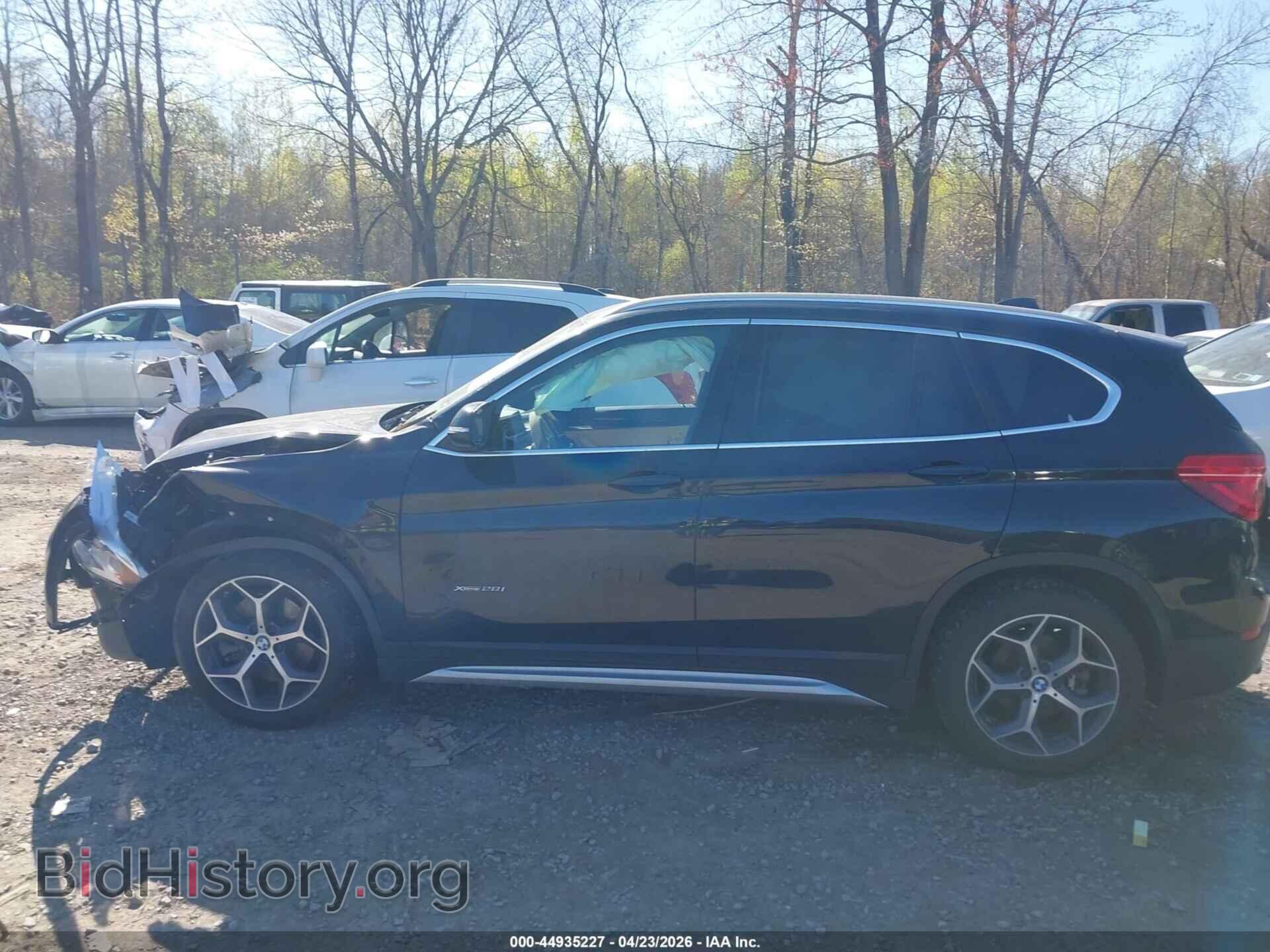2017 BMW X1 - VIN: WBXHT3C38H5F73685 - Фото 13